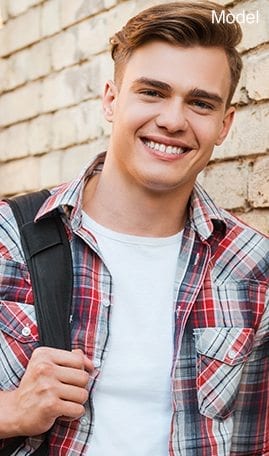 Smiling Male Teen With Backpack - Wisdom Teeth Homepage Procedures Slider