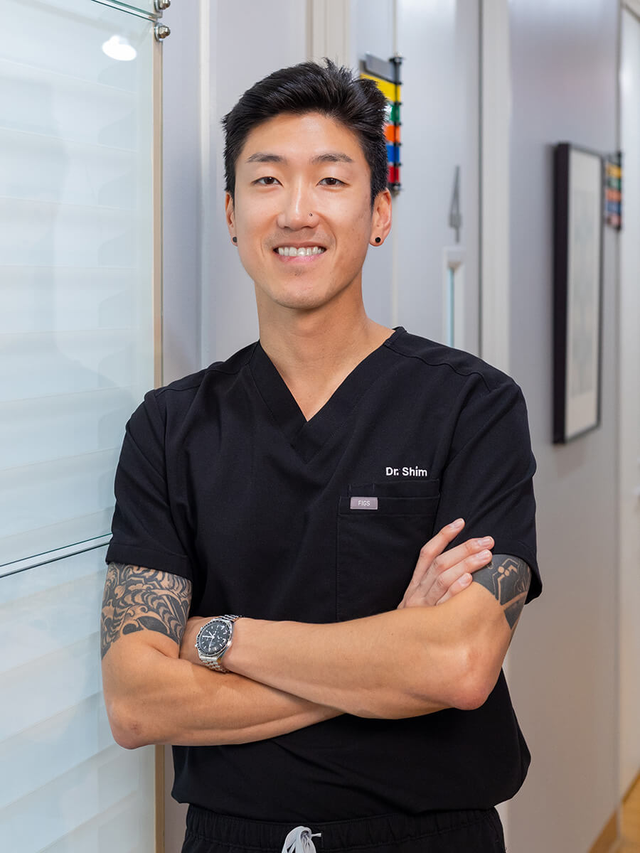 Dr. Shim in black scrubs