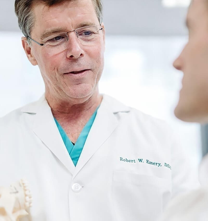 Dr. Emery with a patient