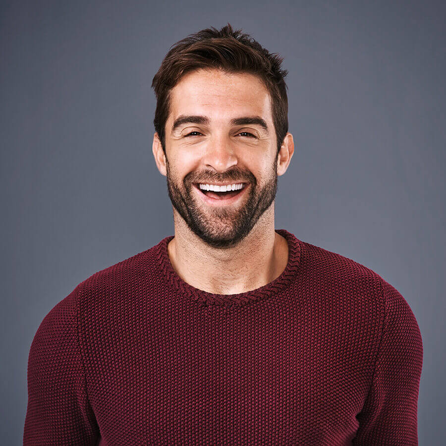 Middle aged man in a red sweater