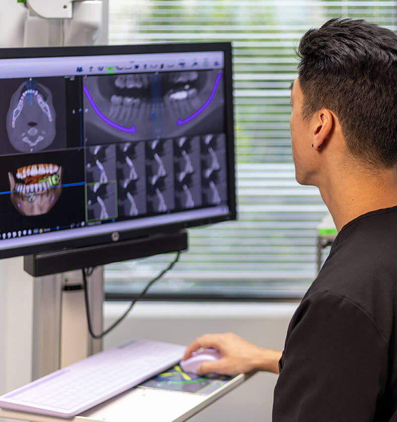 Dr. Shim looking at an x-ray