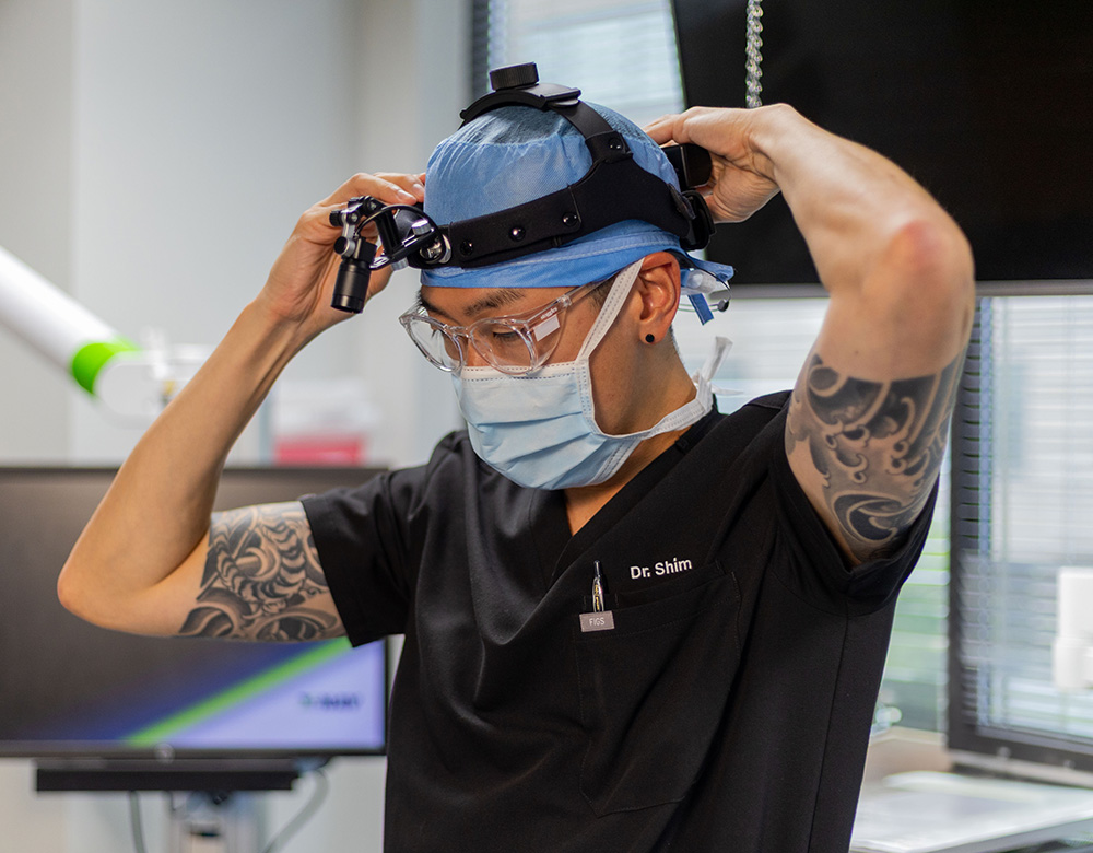 Dr.Shim Putting on Headlight